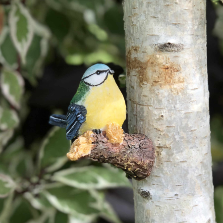 Dekovogel auf Ast gelb