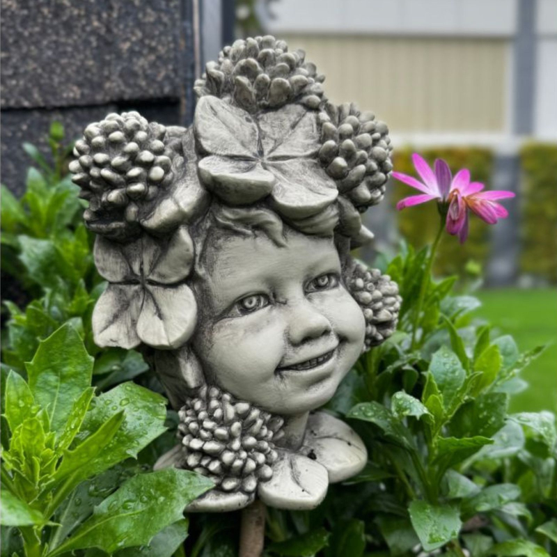 Gartenfigur Blumenkind Glücksklee